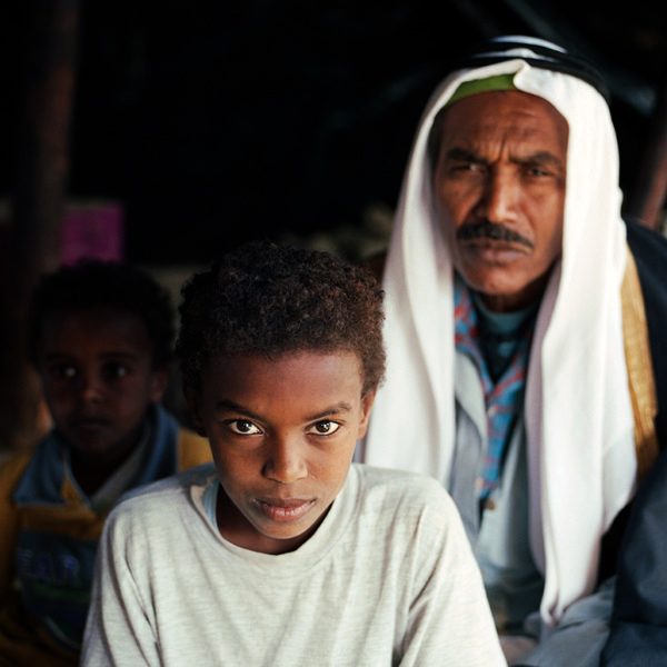 Father and Boys Facing Camera