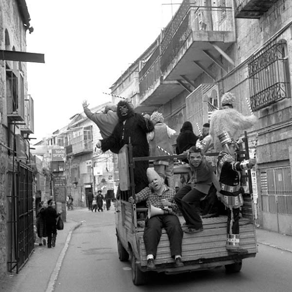 Boys in Masquerade on back of truck